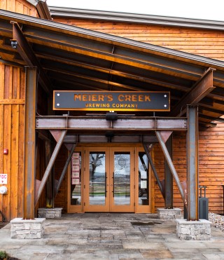 Meier's Creek Group Sitting Outside Patio