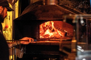 Smokin' hot wood fired pizzas from our 900° oven